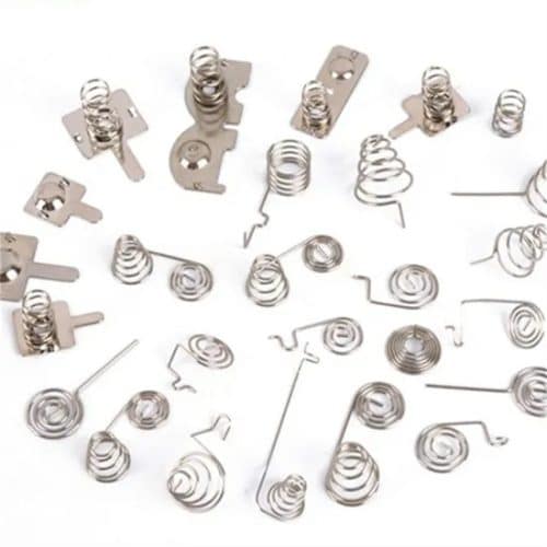 Custom spring type battery contact types for medical devices